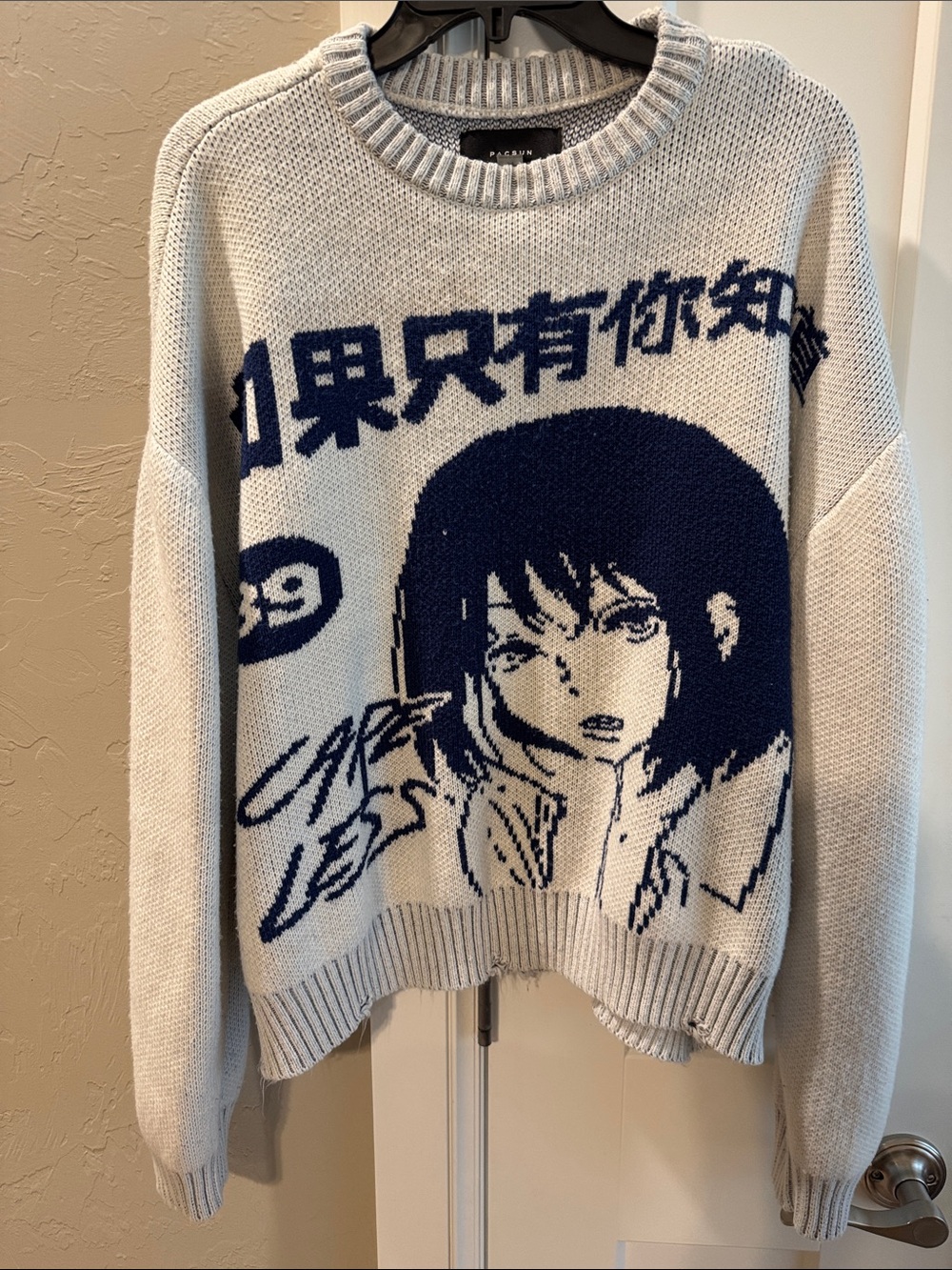 PacSun Cream Crewneck Sweater with Navy Anime Graphici